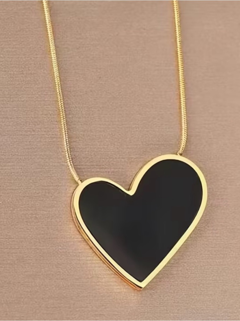 Gold Heart Pendant Necklace with Black Inlay